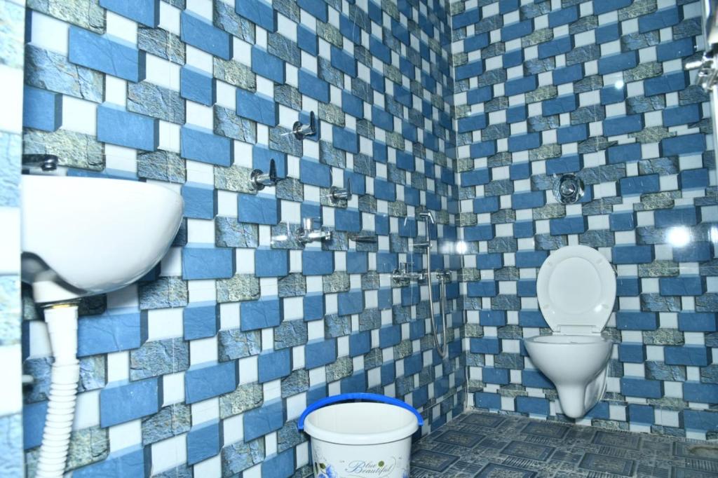 Koupelna v ubytování HOTEL AYUSH INTERNATIONAL