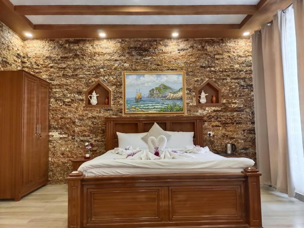 Postel nebo postele na pokoji v ubytování Durrat Nizwa Inn