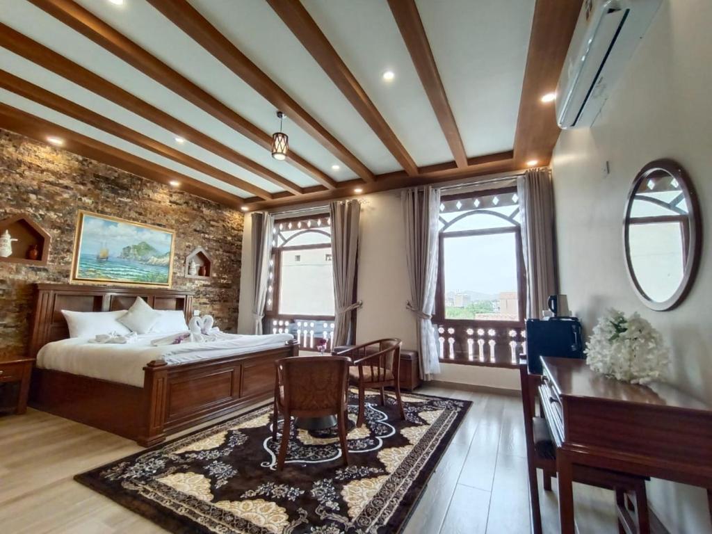 Postel nebo postele na pokoji v ubytování Durrat Nizwa Inn