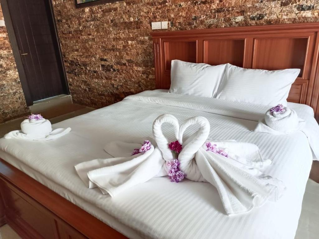 Postel nebo postele na pokoji v ubytování Durrat Nizwa Inn