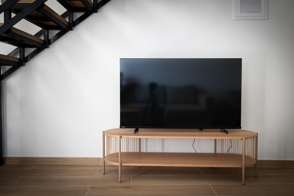 TV a/nebo společenská místnost v ubytování Sogni D' Oro