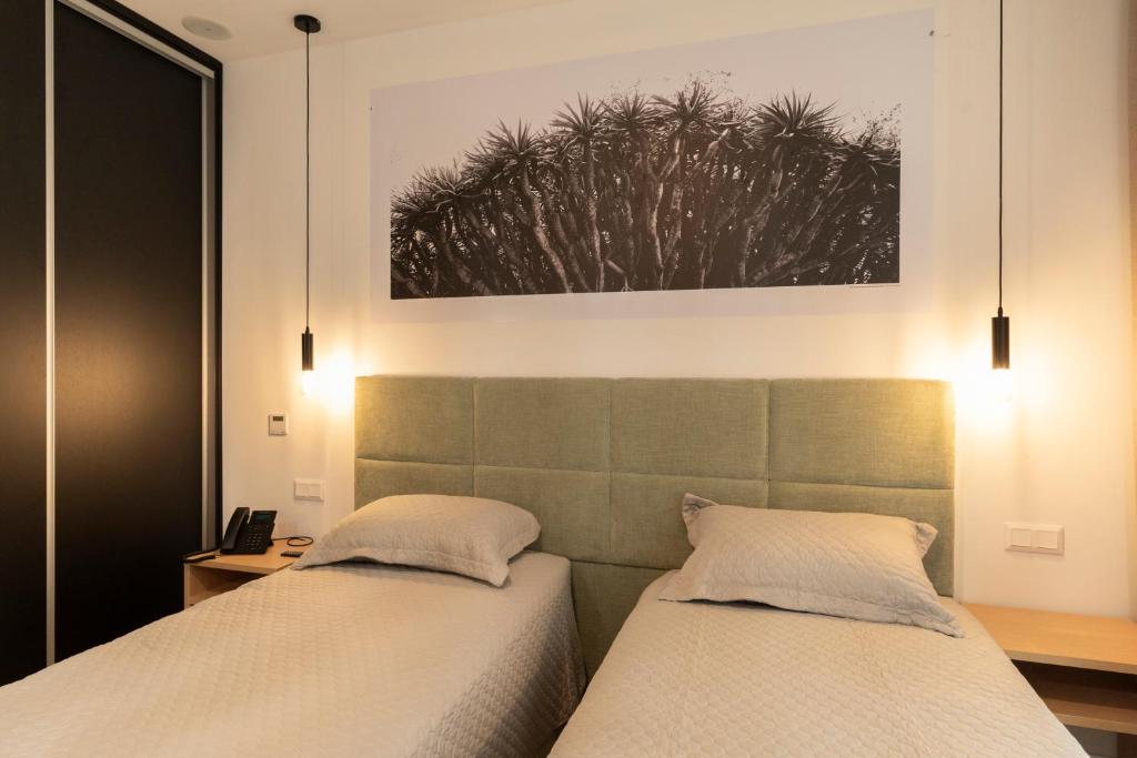 Postel nebo postele na pokoji v ubytování Horta Bay