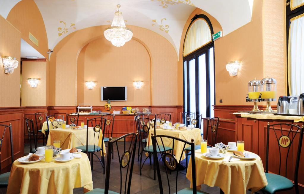 TV a/nebo společenská místnost v ubytování Hotel Patria
