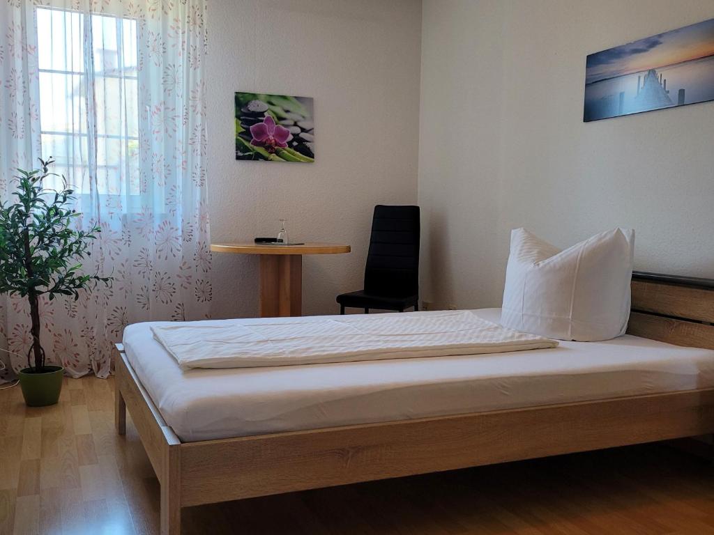 Postel nebo postele na pokoji v ubytování Hotel Scheffelhof
