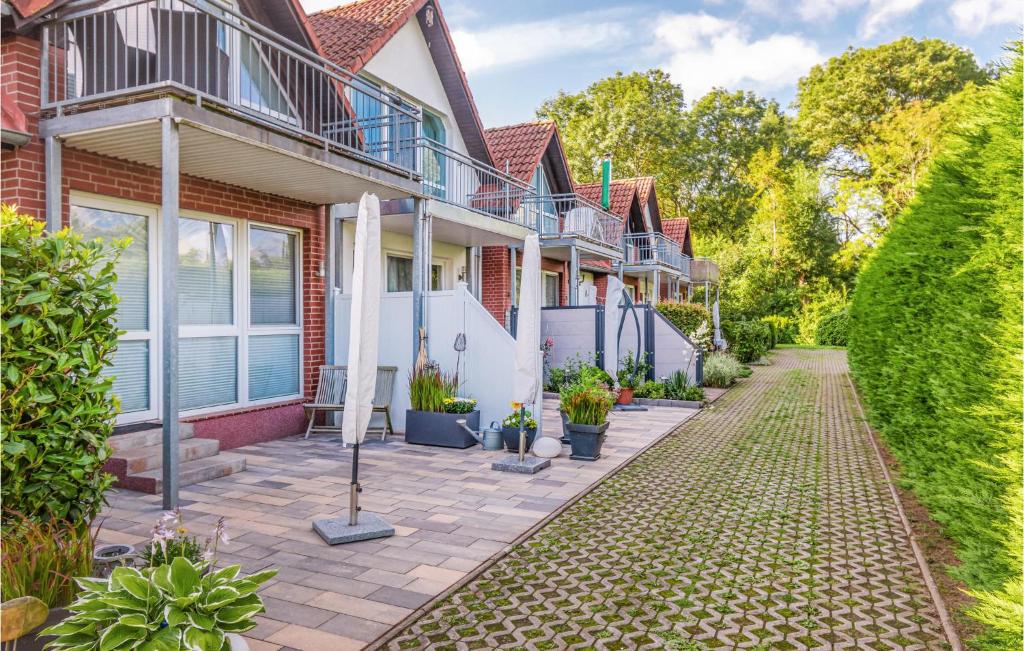 a house with a walkway in front of it at 2 Bedroom Gorgeous Home In Boiensdorf in Boiensdorf