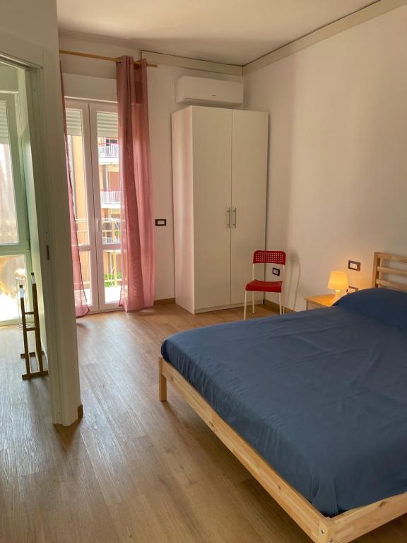 Posteľ alebo postele v izbe v ubytovaní Appartamento Corallo