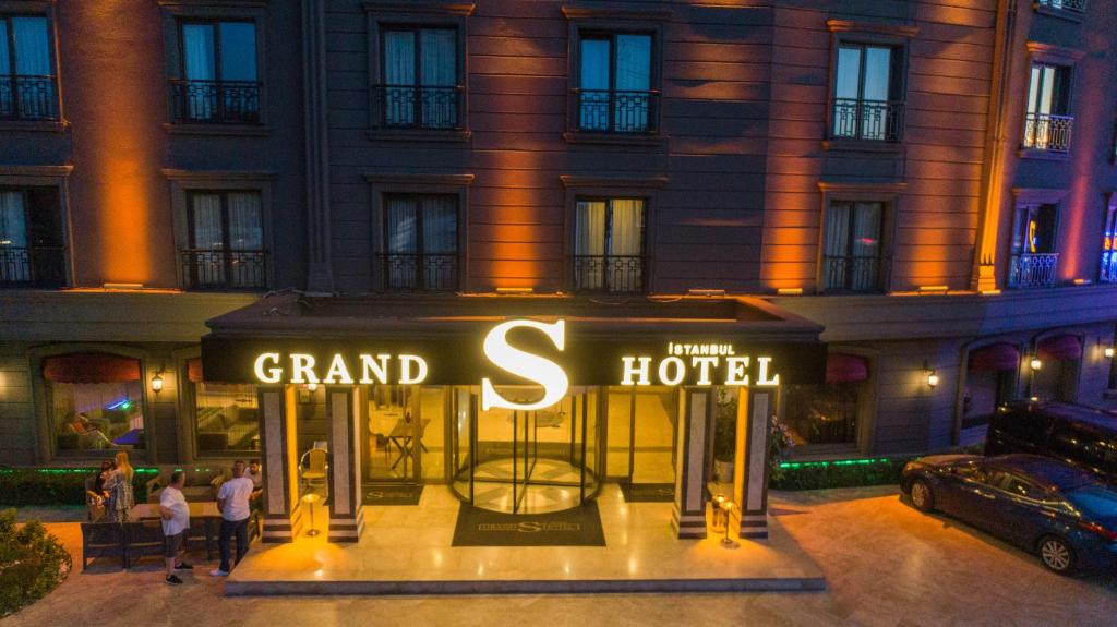 a sign that reads grand s hotel in front of a building at Grand S Hotel in Istanbul
