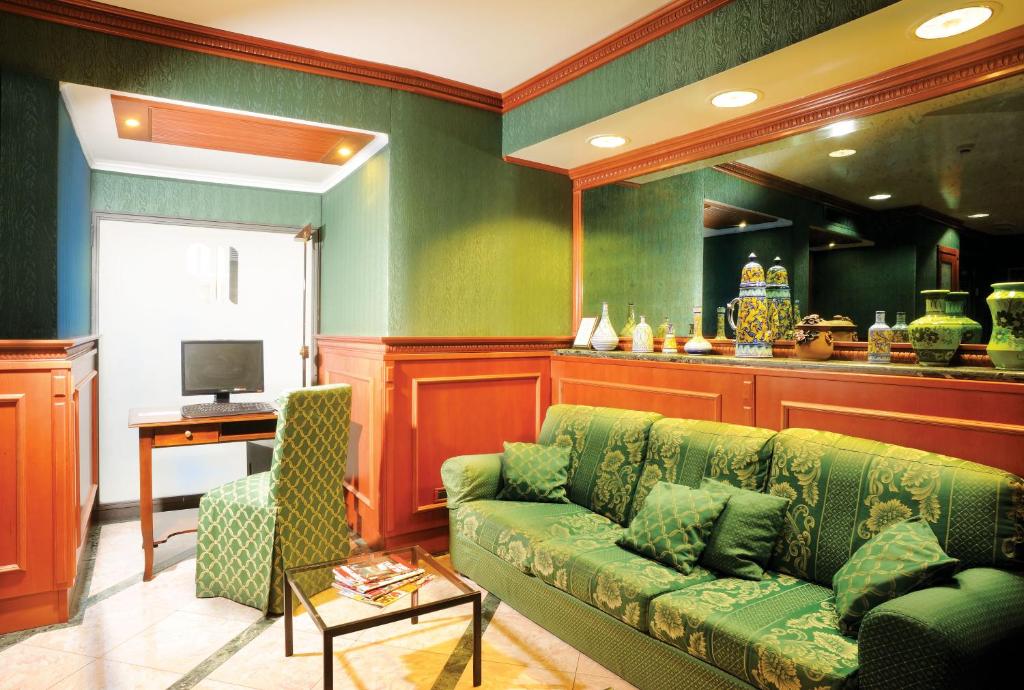 TV a/nebo společenská místnost v ubytování Hotel Patria