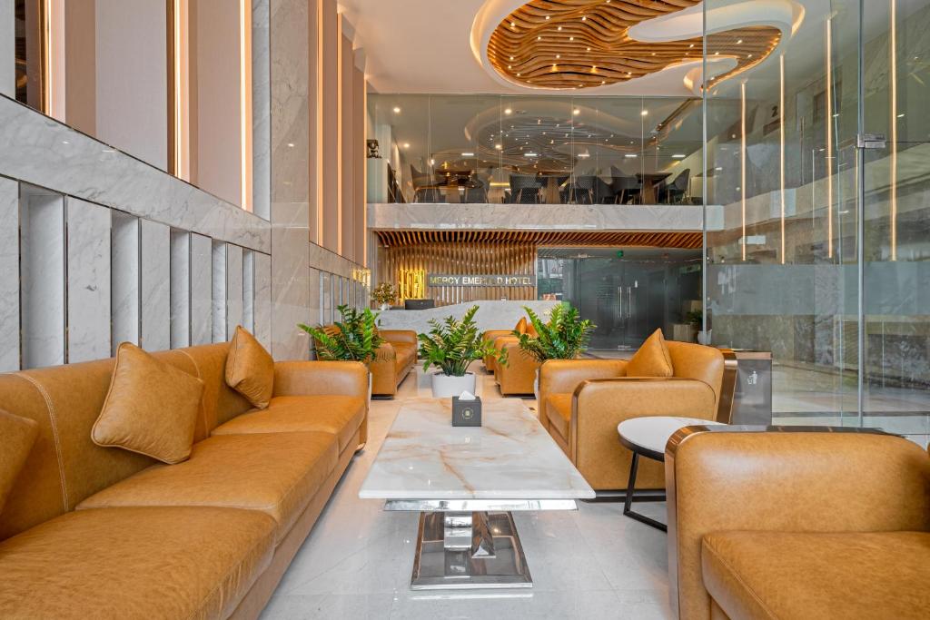 Area soggiorno di Mercy Emerald Hotel