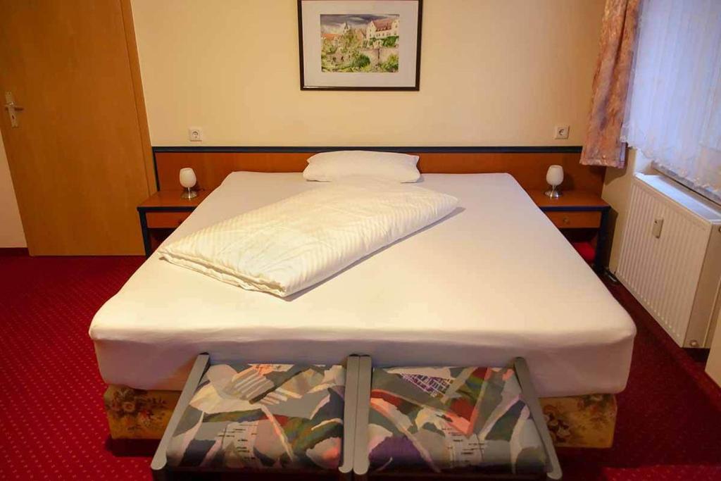 Postel nebo postele na pokoji v ubytování Pension Wehner
