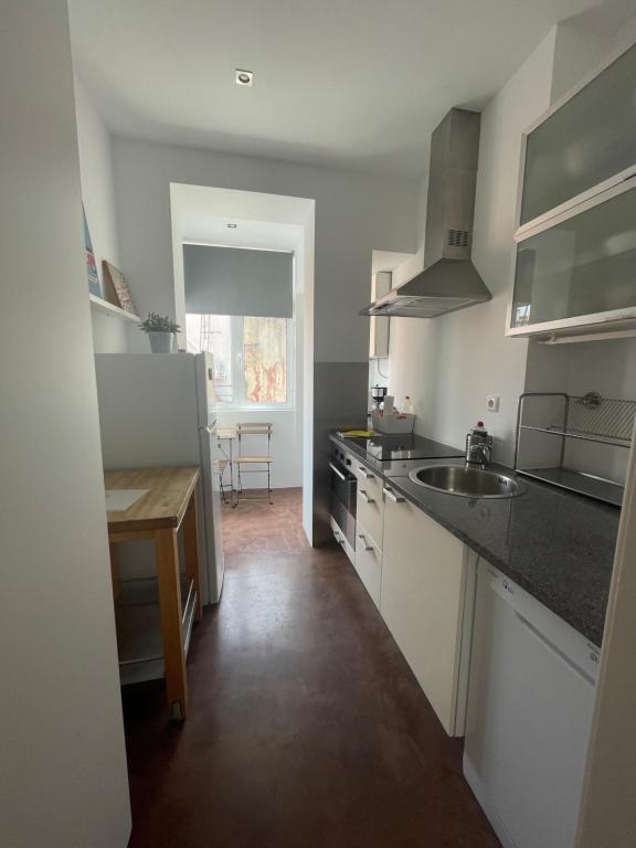 Kuchyň nebo kuchyňský kout v ubytování Penha Cozy Home