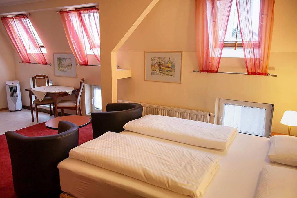 Postel nebo postele na pokoji v ubytování Pension Wehner