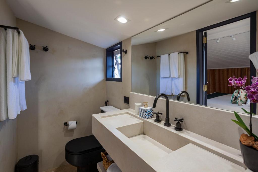 Koupelna v ubytování Sandi Hotel