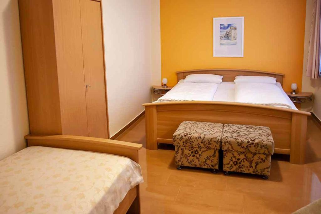 Postel nebo postele na pokoji v ubytování Pension Wehner