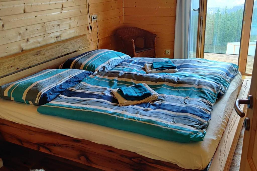 Postel nebo postele na pokoji v ubytování Chalet Luna