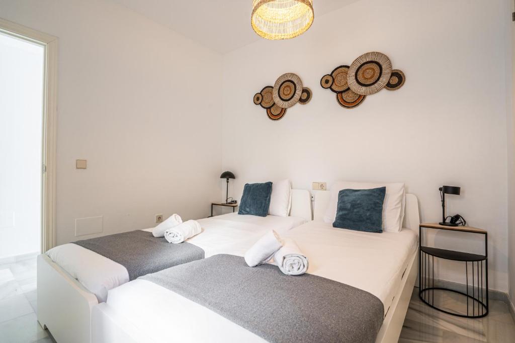 Postel nebo postele na pokoji v ubytování Stay U-nique Apartment Plaza del Patrocinio