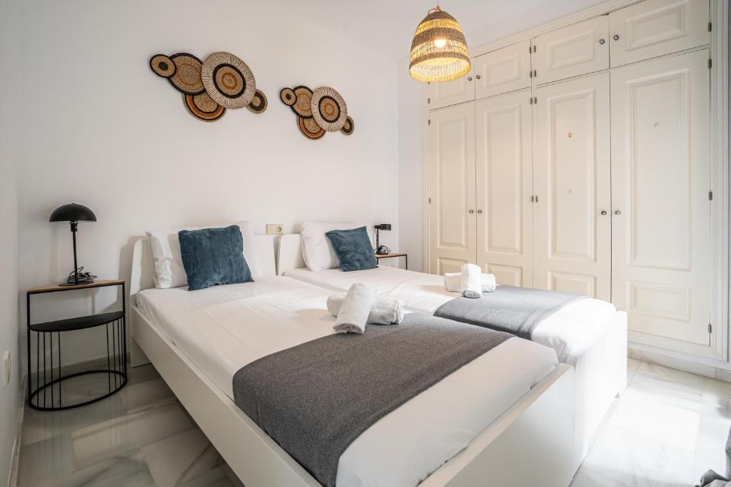 Postel nebo postele na pokoji v ubytování Stay U-nique Apartment Plaza del Patrocinio