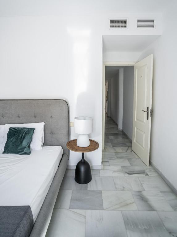 Postel nebo postele na pokoji v ubytování Stay U-nique Apartment Plaza del Patrocinio
