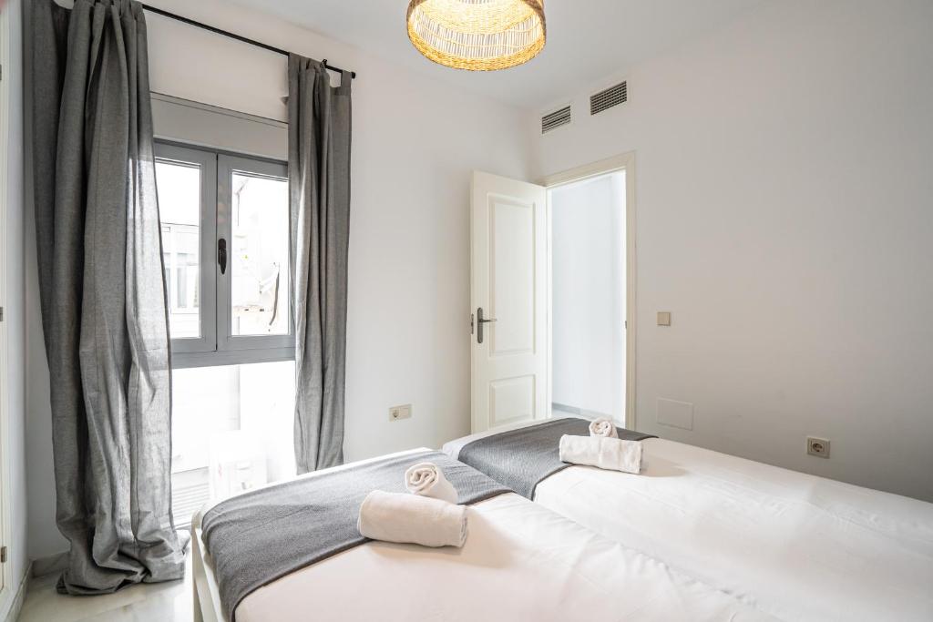 Postel nebo postele na pokoji v ubytování Stay U-nique Apartment Plaza del Patrocinio