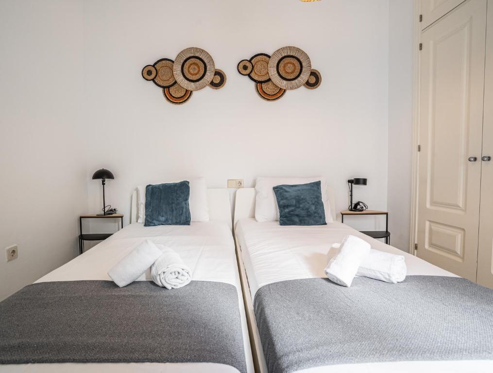Postel nebo postele na pokoji v ubytování Stay U-nique Apartment Plaza del Patrocinio
