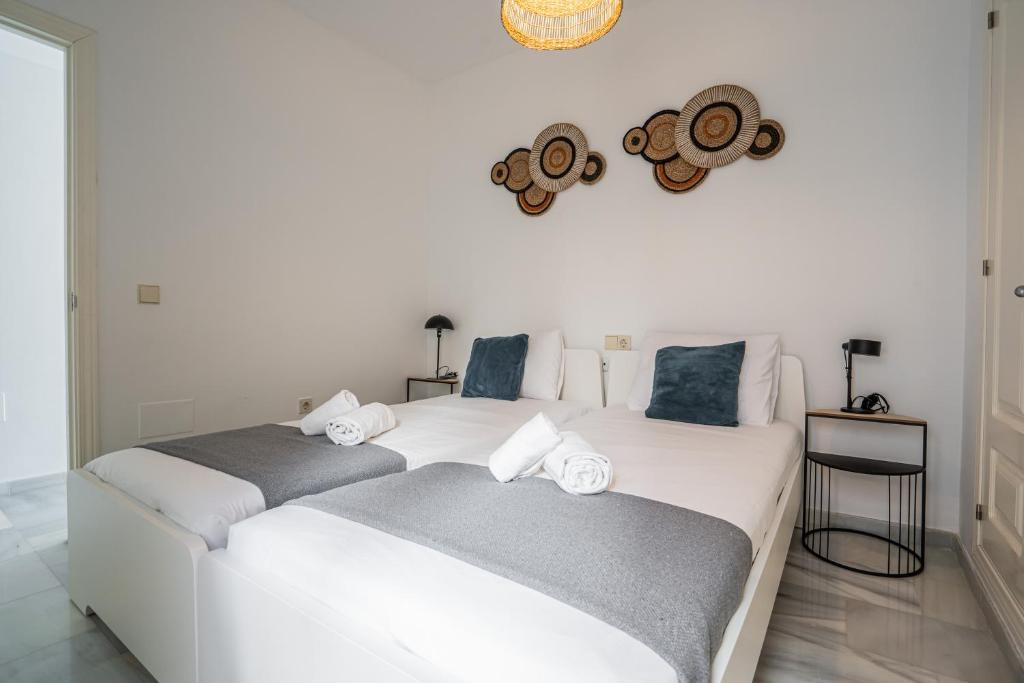 Postel nebo postele na pokoji v ubytování Stay U-nique Apartment Plaza del Patrocinio