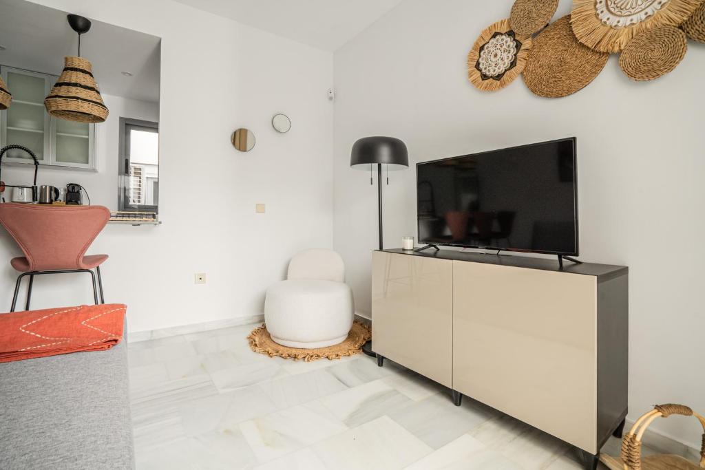 TV a/nebo společenská místnost v ubytování Stay U-nique Apartment Plaza del Patrocinio