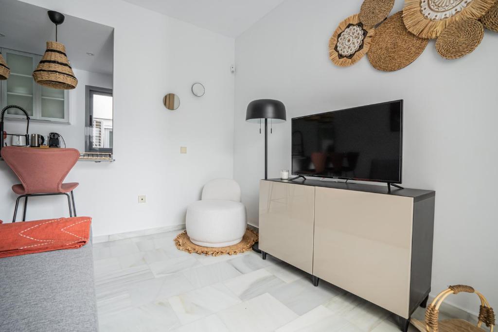 TV a/nebo společenská místnost v ubytování Stay U-nique Apartment Plaza del Patrocinio