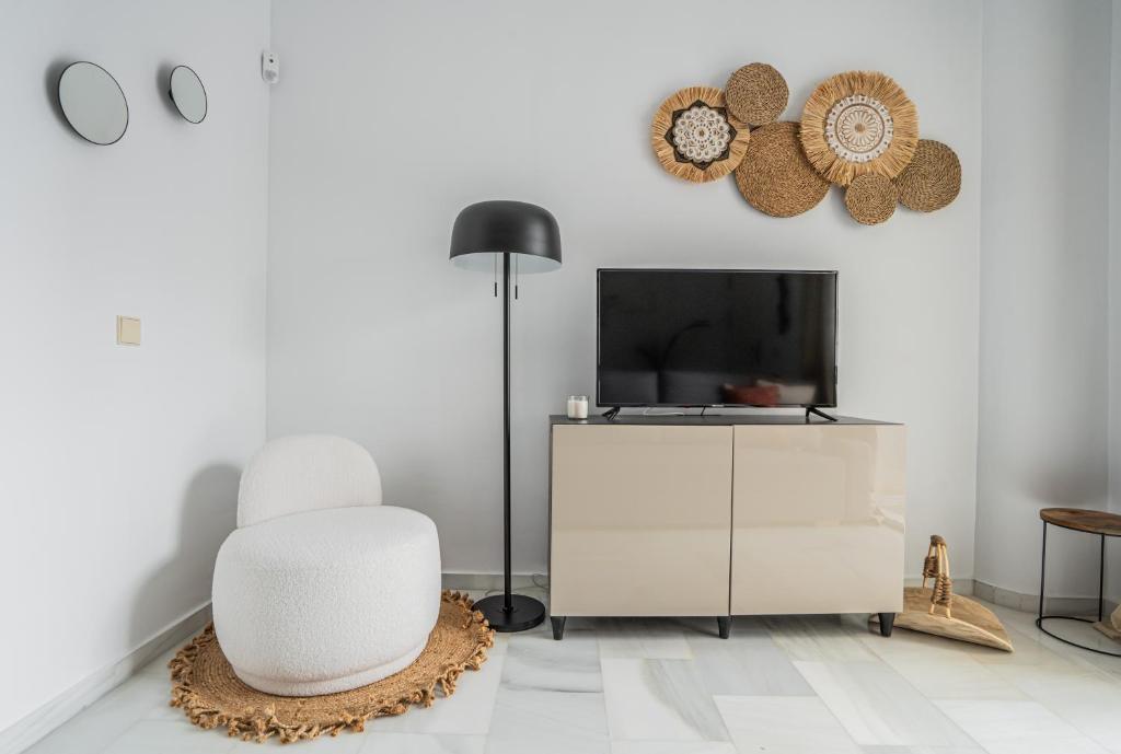 TV a/nebo společenská místnost v ubytování Stay U-nique Apartment Plaza del Patrocinio