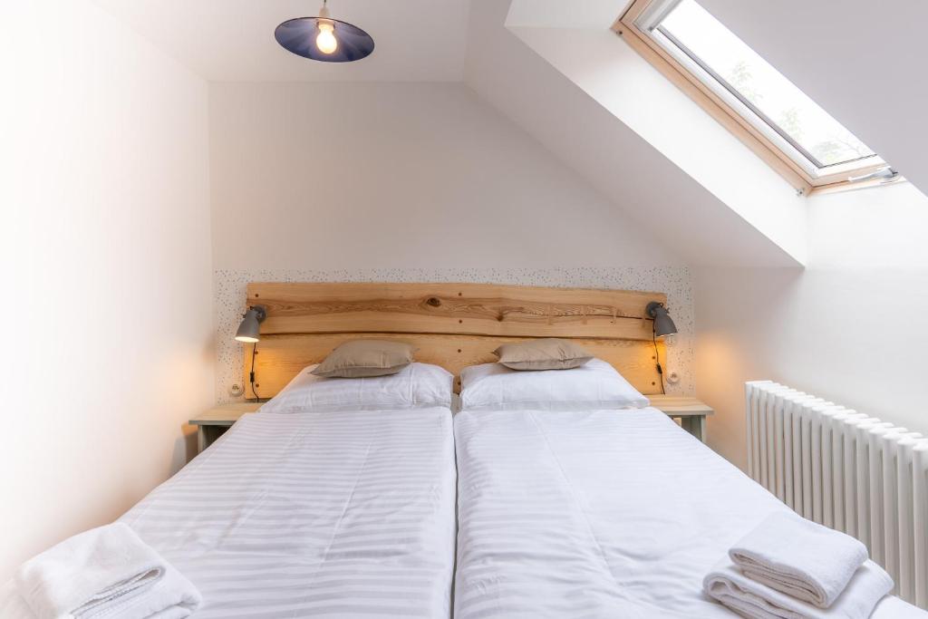 Postel nebo postele na pokoji v ubytování Hotel Lechowitz