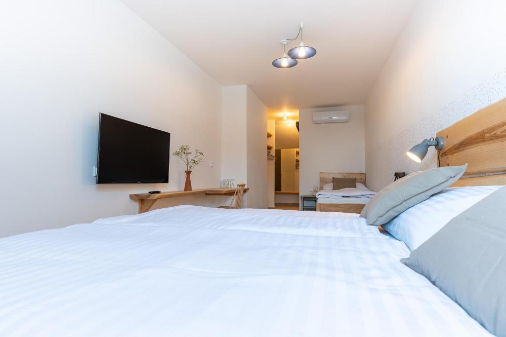 Postel nebo postele na pokoji v ubytování Hotel Lechowitz