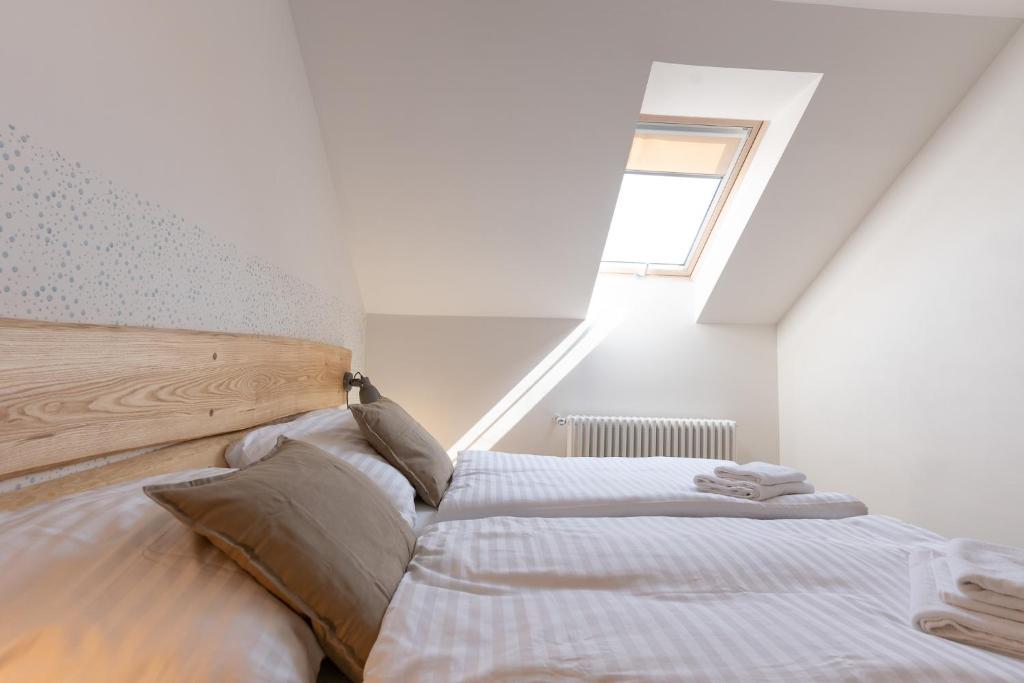 Postel nebo postele na pokoji v ubytování Hotel Lechowitz