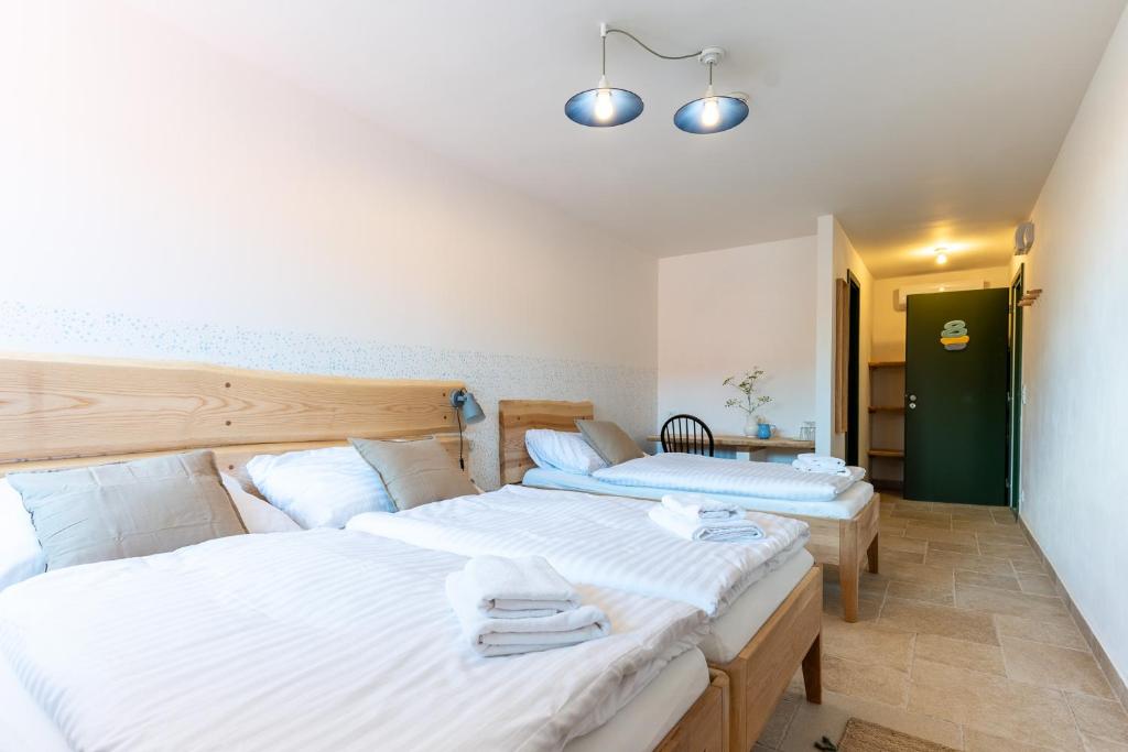 Postel nebo postele na pokoji v ubytování Hotel Lechowitz