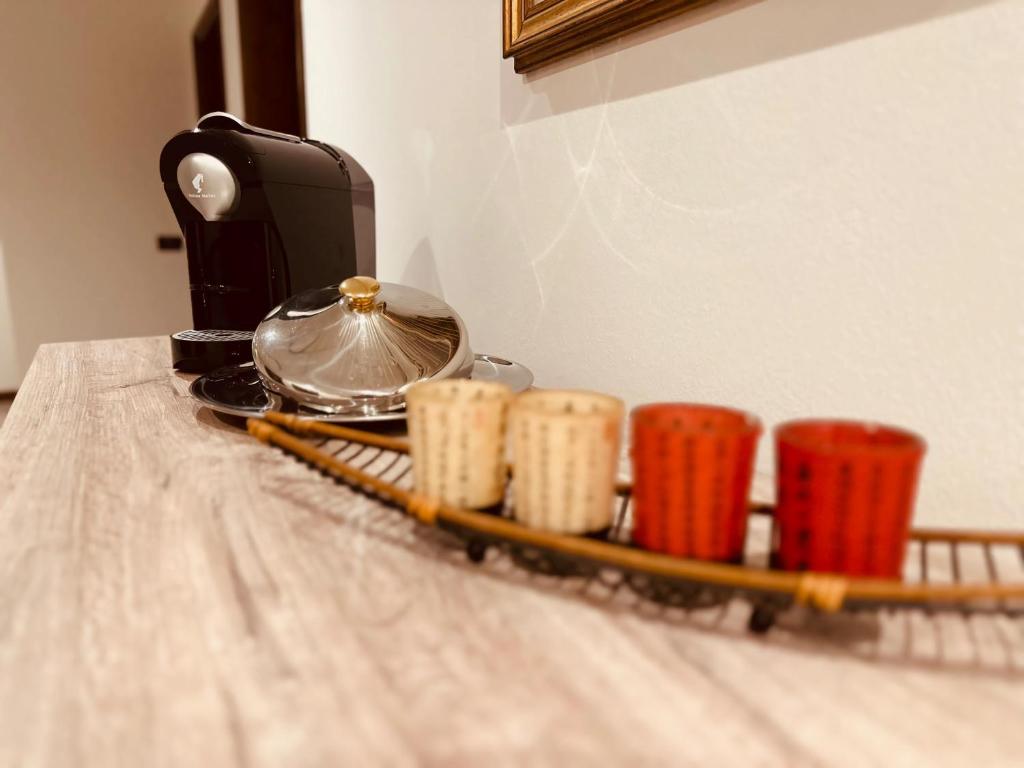 Příslušenství pro přípravu čaje a kávy v ubytování Hotel Banatium B&B Cucina