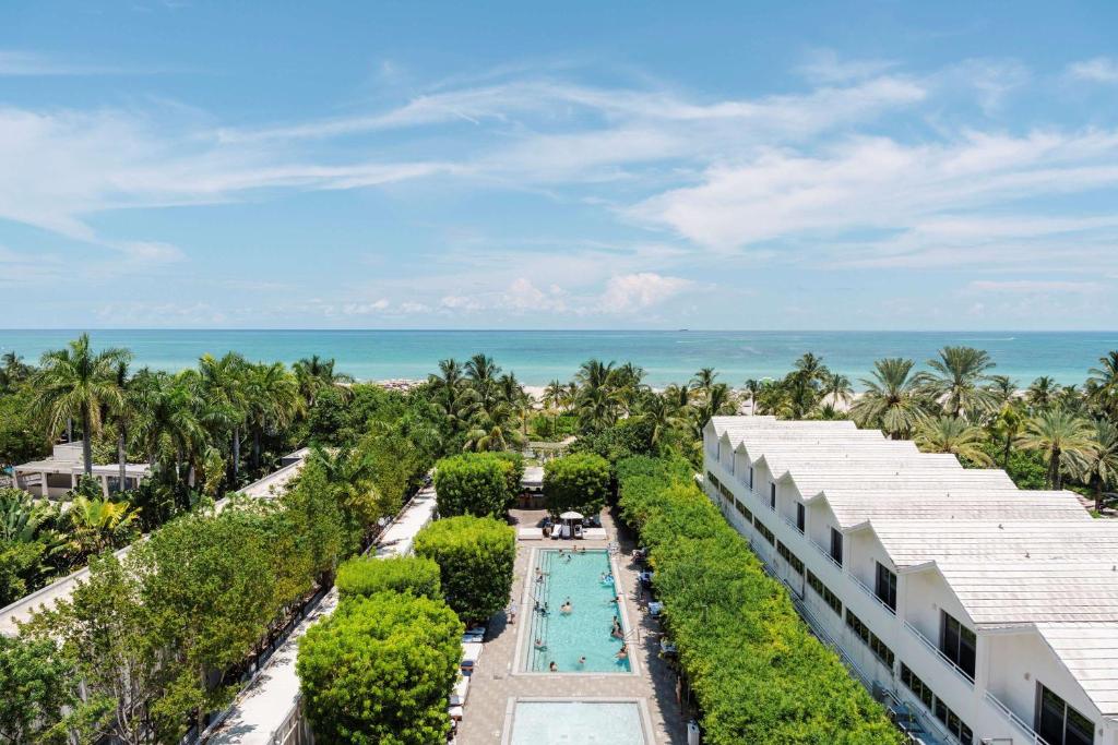 an aerial view of a resort with the ocean in the background at Nautilus Sonesta Miami Beach in Miami Beach
