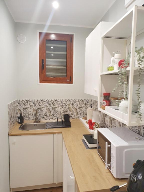 Kuchyňa alebo kuchynka v ubytovaní La dimora di Don Vito - Appartamento confortevole