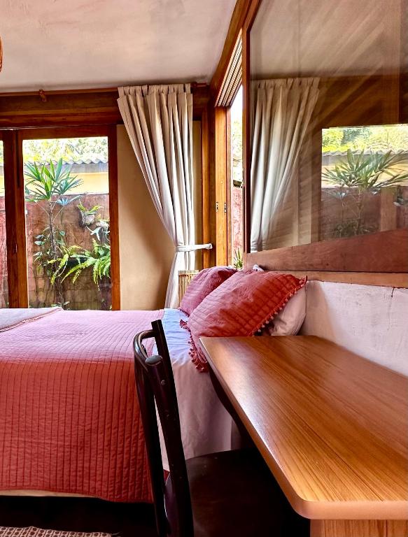 Cama ou camas em um quarto em Casa da Arquiteta Guest House