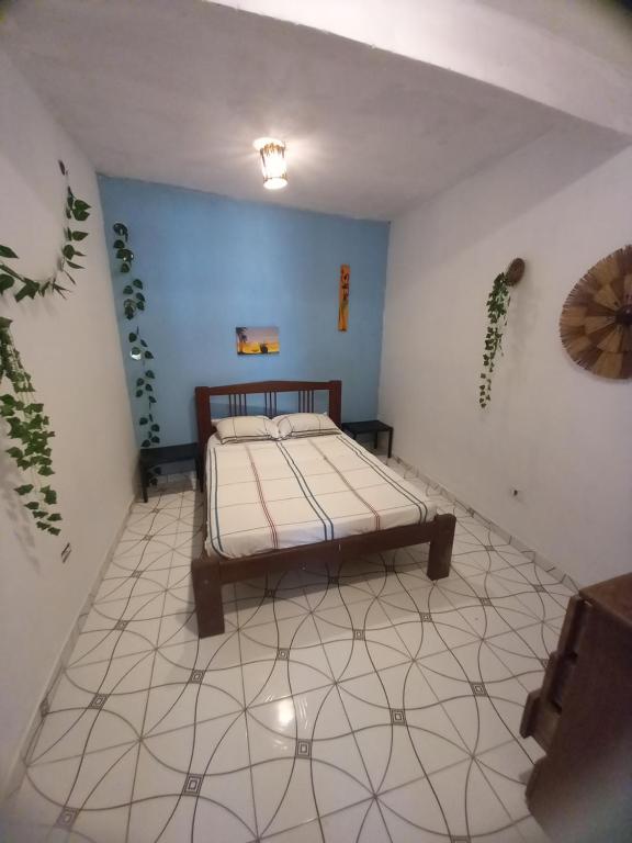 Postel nebo postele na pokoji v ubytování Tranquilandia Hostel
