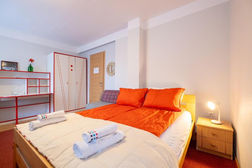 Postel nebo postele na pokoji v ubytování Guesthouse Rose