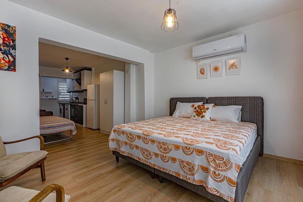 Postel nebo postele na pokoji v ubytování Güneş Villa Bahçe Katı