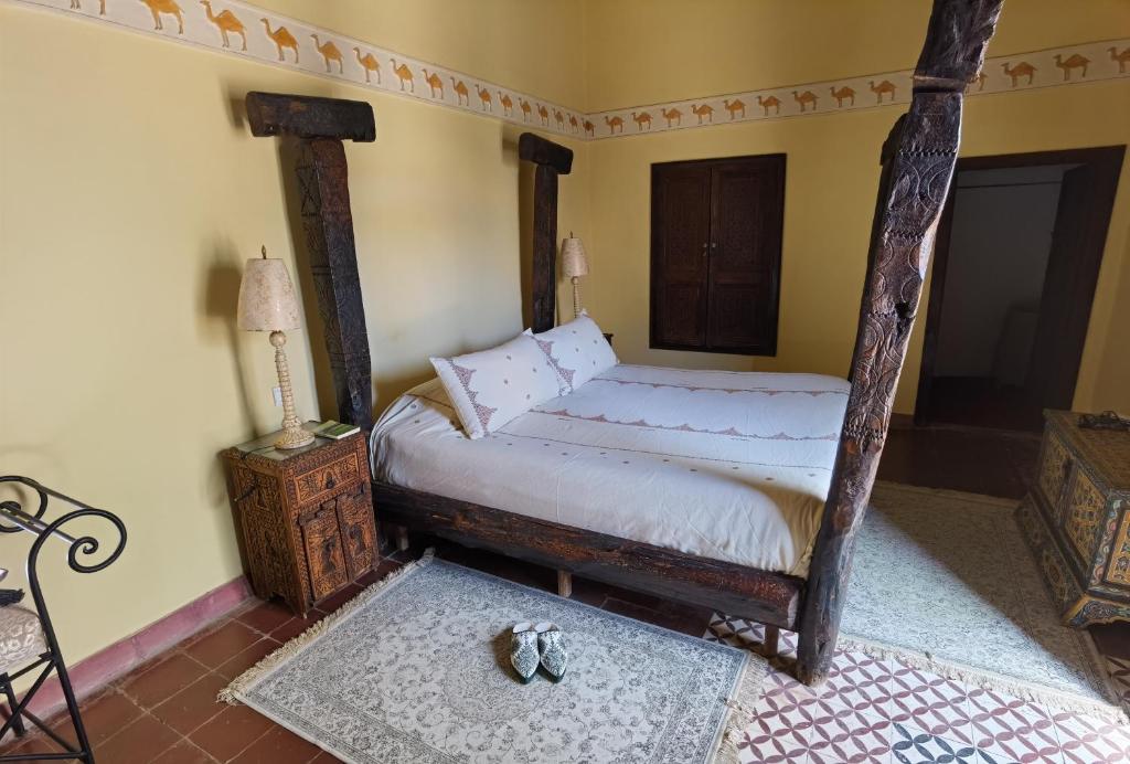 Postel nebo postele na pokoji v ubytování Palais didi