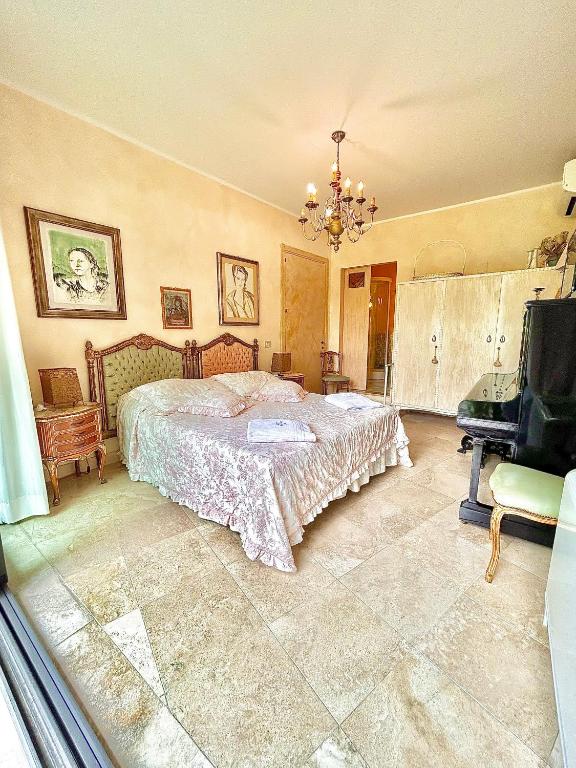 Postel nebo postele na pokoji v ubytování Le due palme Bed & Breakfast