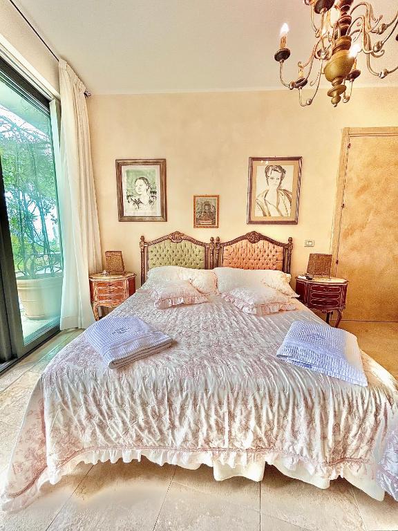 Postel nebo postele na pokoji v ubytování Le due palme Bed & Breakfast