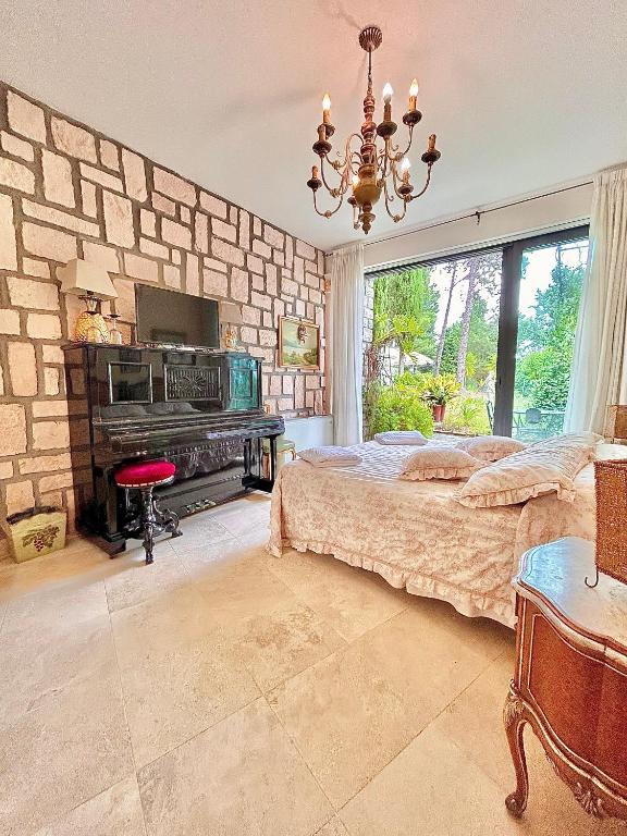 Postel nebo postele na pokoji v ubytování Le due palme Bed & Breakfast