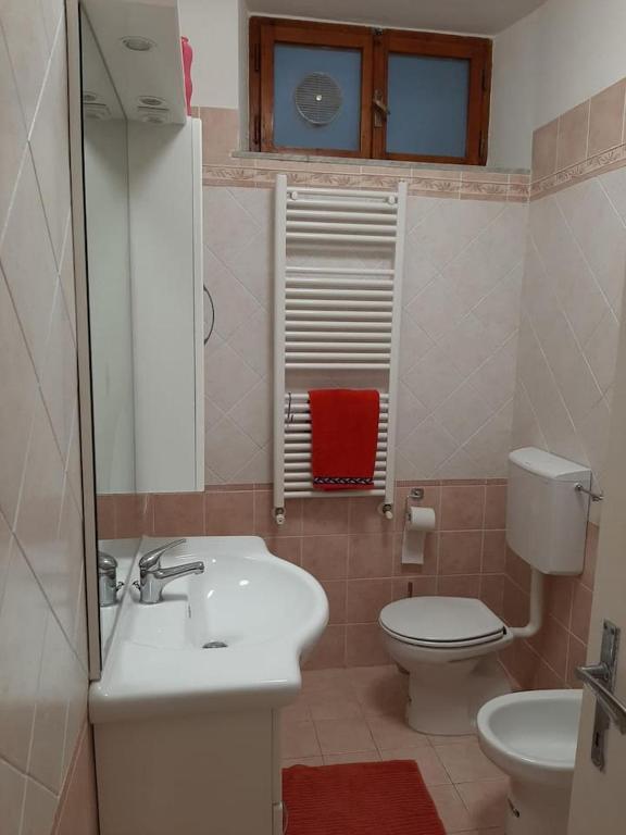 Koupelna v ubytování La casa in pineta