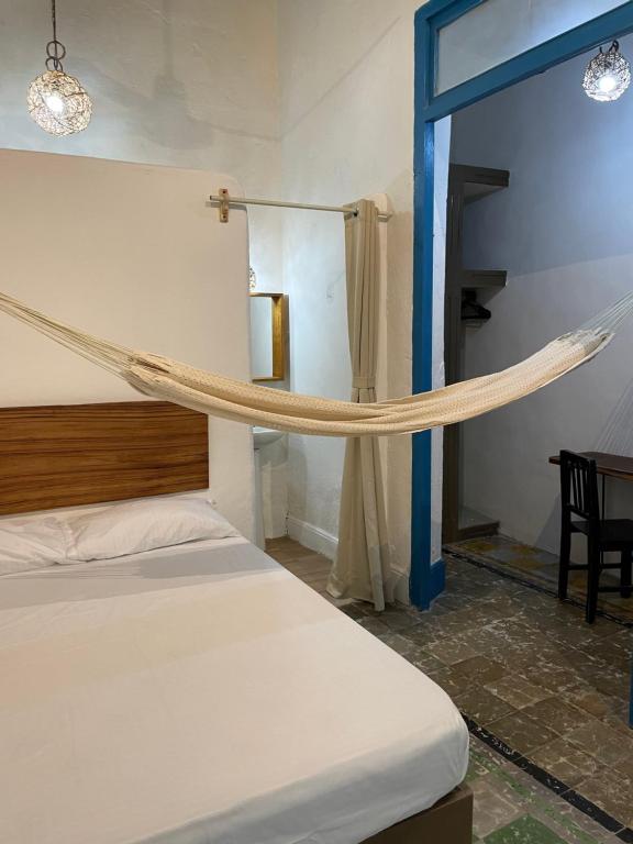Postel nebo postele na pokoji v ubytování Bleu Downtown