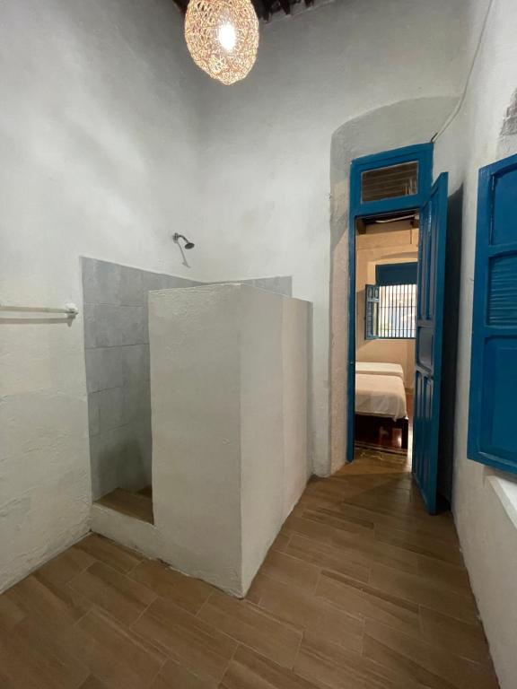Postel nebo postele na pokoji v ubytování Bleu Downtown