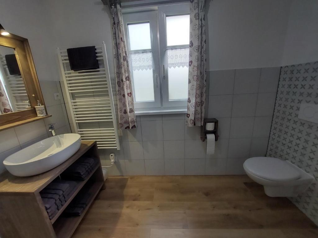 Koupelna v ubytování Apartmány Ema a Ela