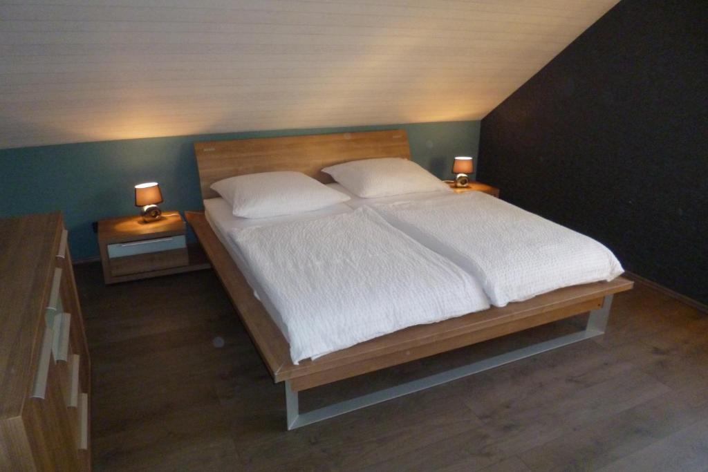 Postel nebo postele na pokoji v ubytování Haus Weinheck