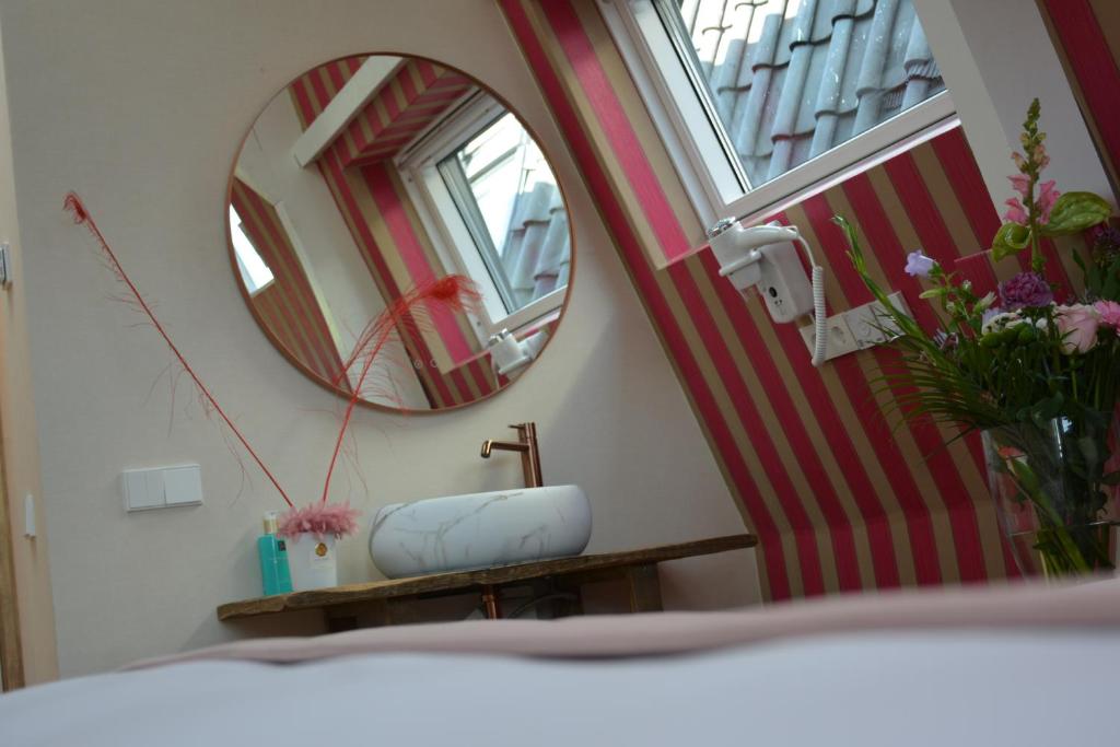Postel nebo postele na pokoji v ubytování The IF Boutique hotel