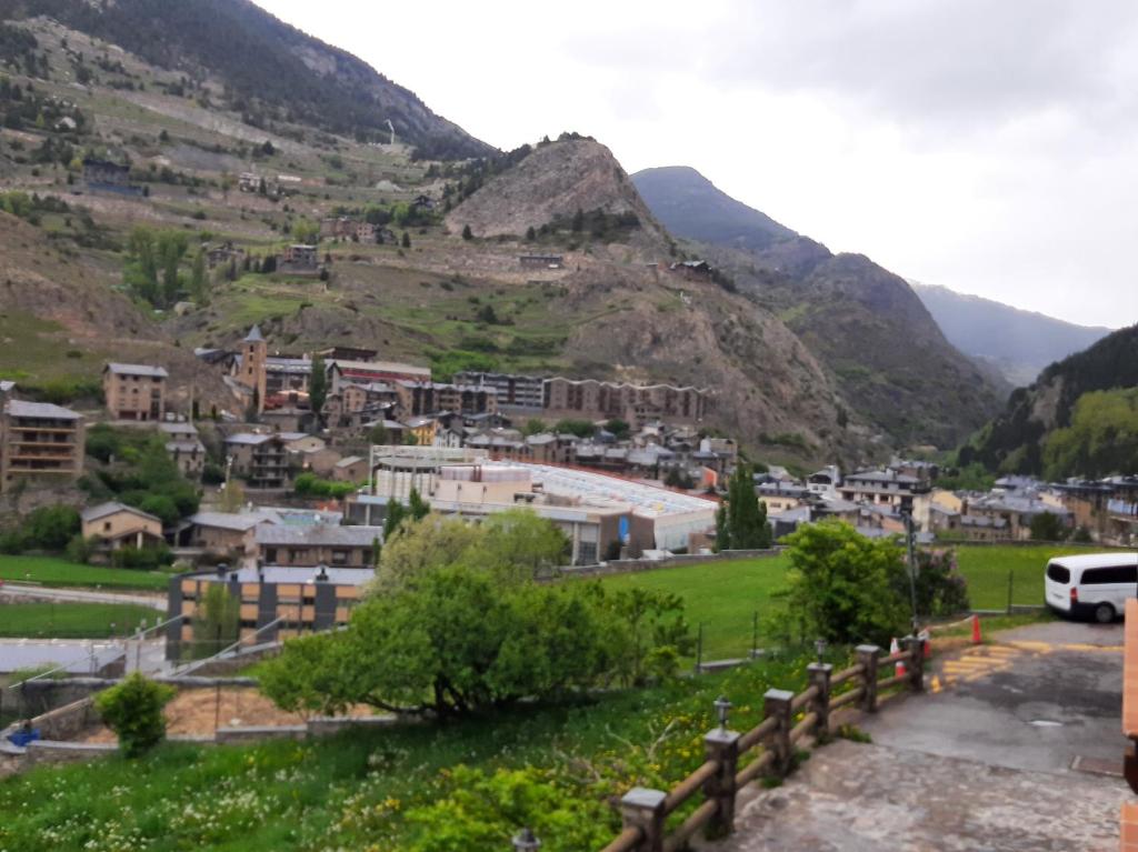 a view of a town in the mountains at Flor de Muntanya in Canillo